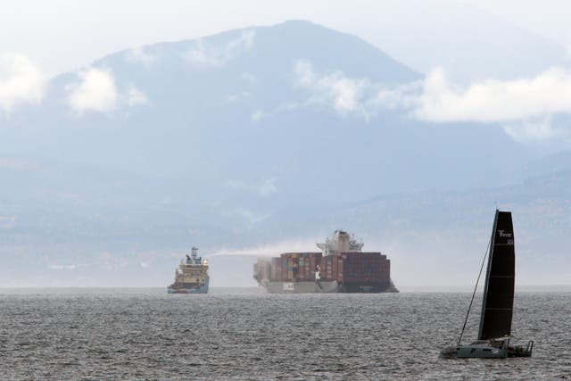 <p>Ships work to control a fire onboard the MV Zim Kingston about eight kilometres from the shore in Victoria, British Columbia</p>