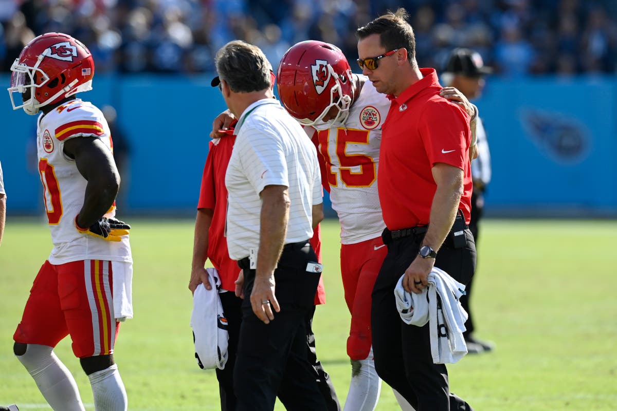 Kansas City Chiefs quarterback Patrick Mahomes (15) is tackled by