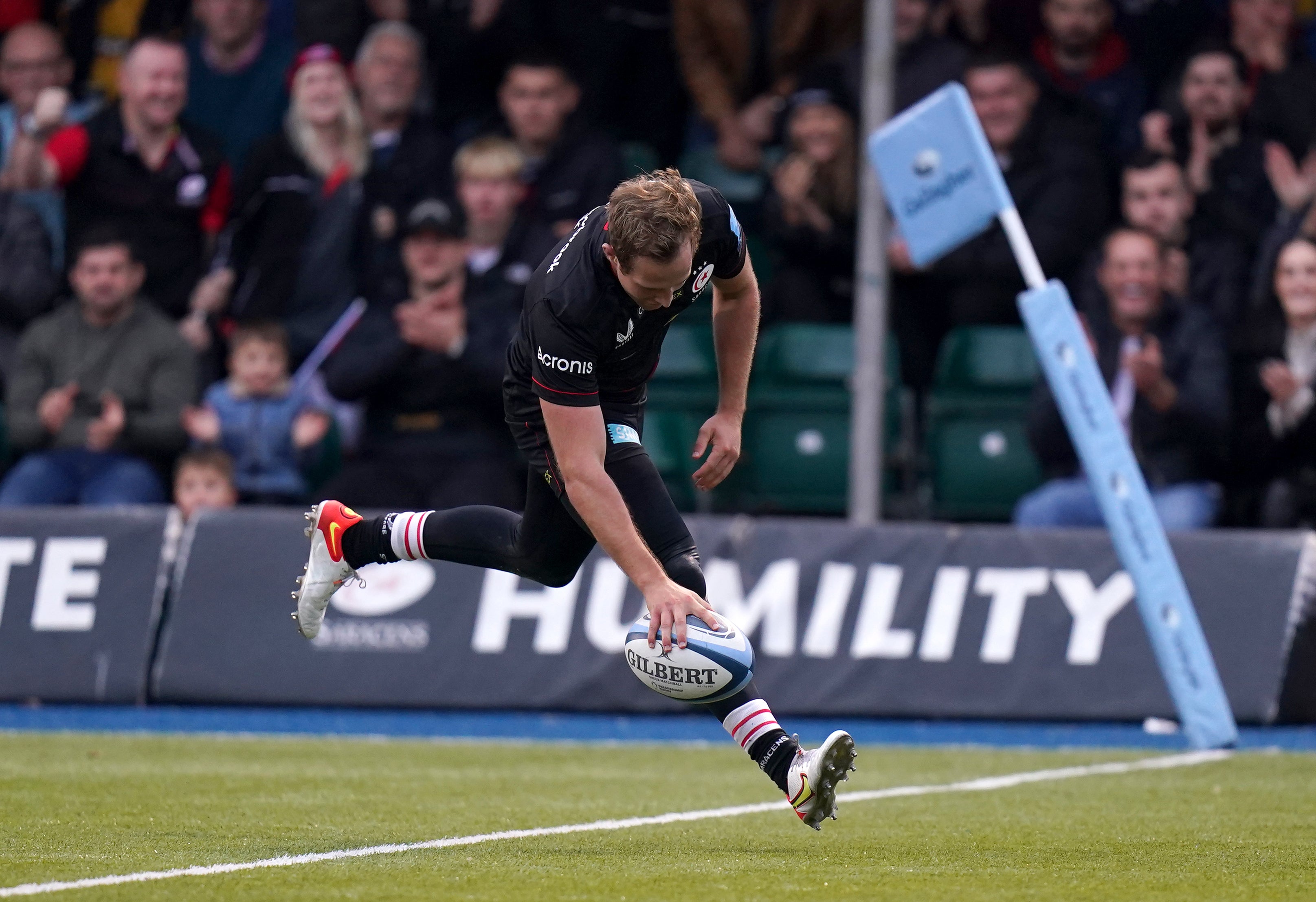 Saracens’ Max Malins scores his side’s sixth try during the Gallagher Premiership win over Wasps (Adam Davy/PA)