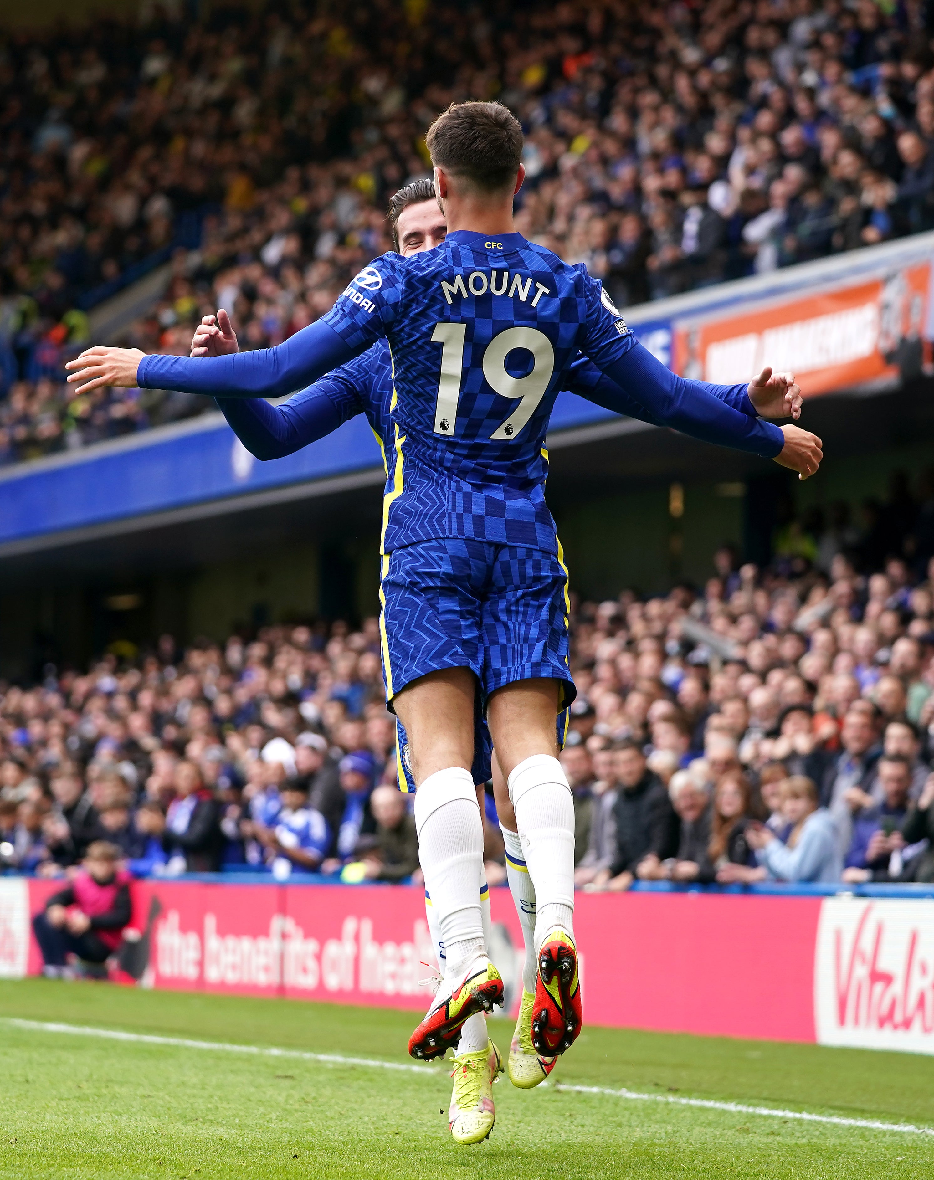 Chelsea’s Mason Mount celebrates scoring his side’s first goal in the 7-0 win over Norwich (Tess Derry/PA)