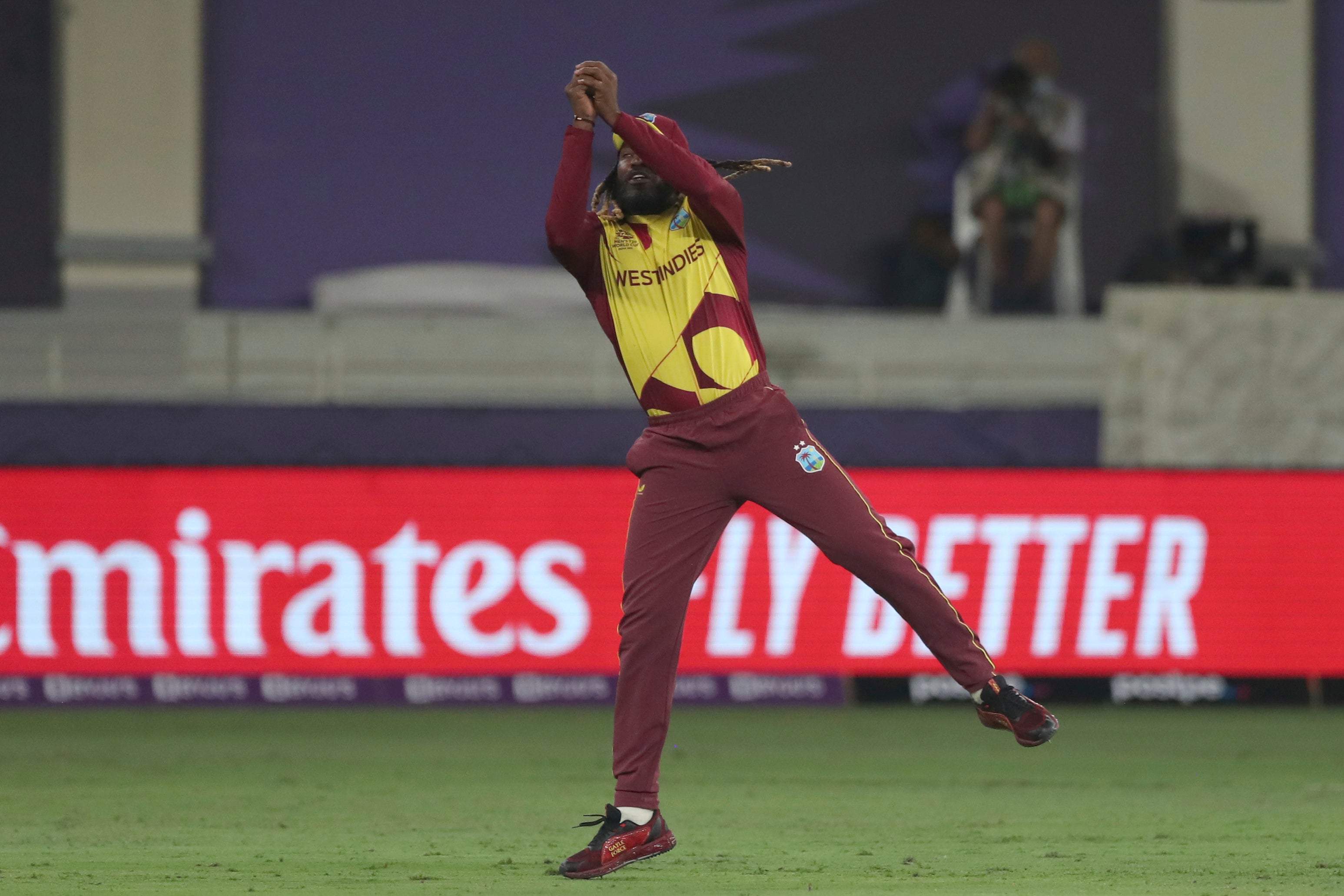 West Indies’ Chris Gayle takes a catch to dismiss England’s Jason Roy in their T20 World Cup match in Dubai (Aijaz Rahi/PA)