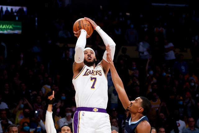 Los Angeles Lakers forward Carmelo Anthony shoots over Memphis Grizzlies guard De’Anthony Melton (Ringo Chiu/AP)