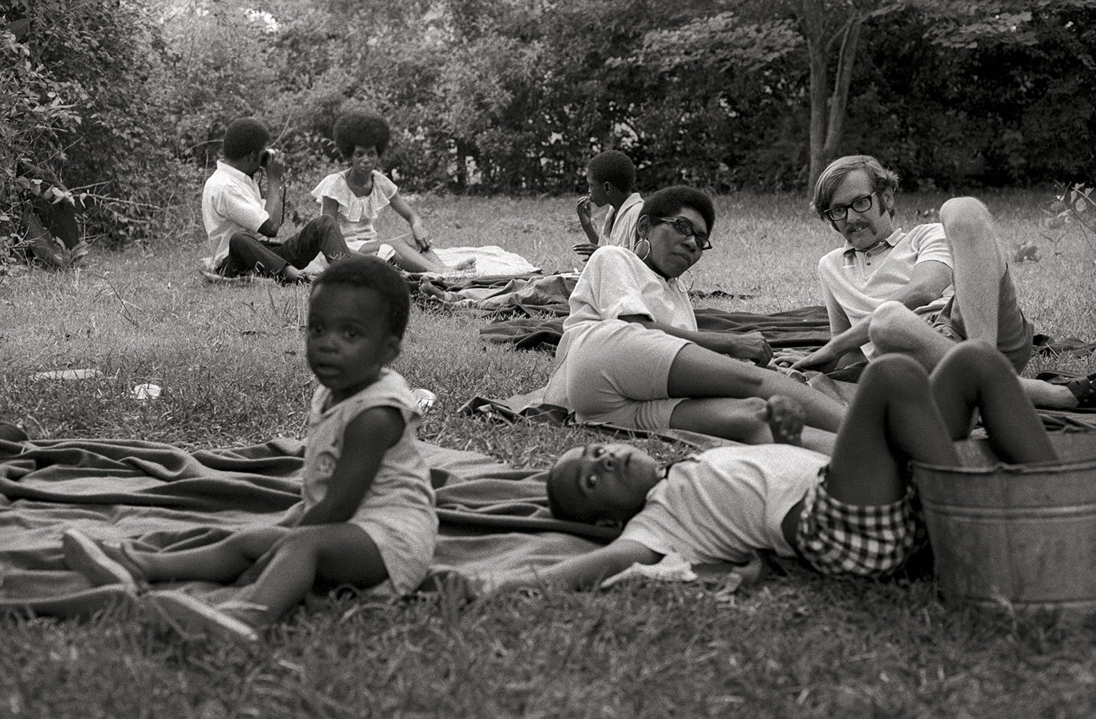 ‘Southern Media staff member Larry Rand and civil rights workers at the Erwin family farm, Tougaloo, Mississippi’, 1969