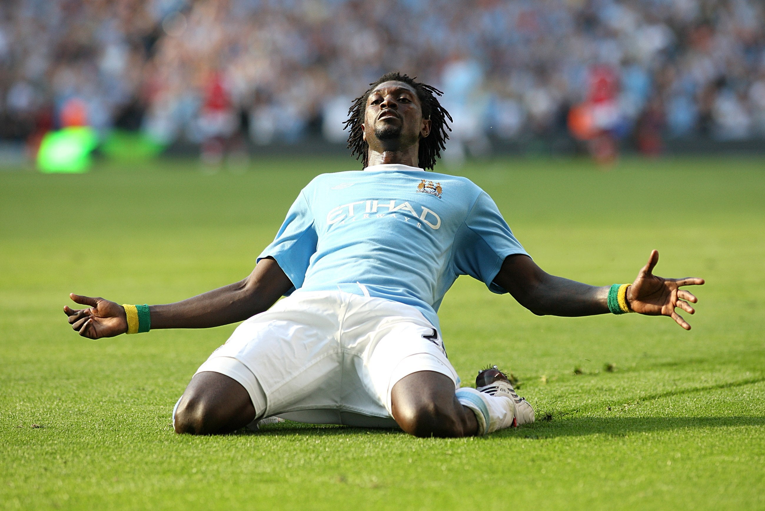 Emmanuel Adebayor celebrates scoring for Manchester City against his former club Arsenal in 2009 (Nick Potts/PA)