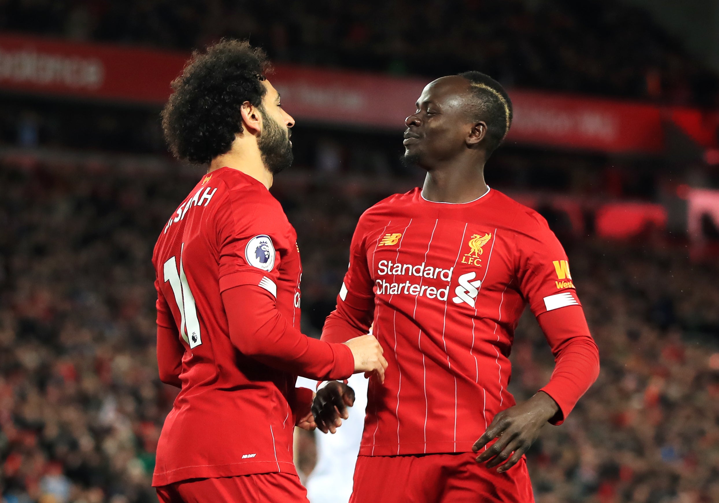 Sadio Mane, right, and Salah have thrived together at Liverpool (Peter Byrne/PA)