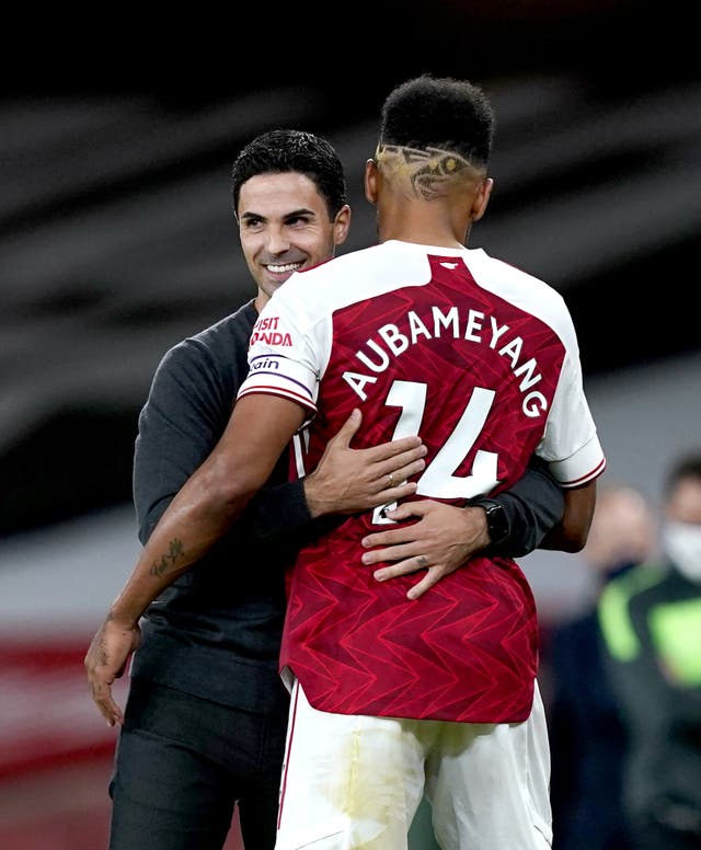 Arsenal manager Mikel Arteta (left) has been impressed with Pierre-Emerick Aubameyang of late (Will Oliver/PA)