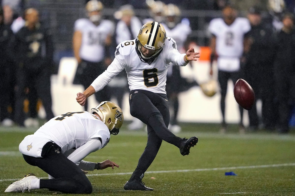 NFL: New Orleans Saints survive downpour to claim 13-10 win over