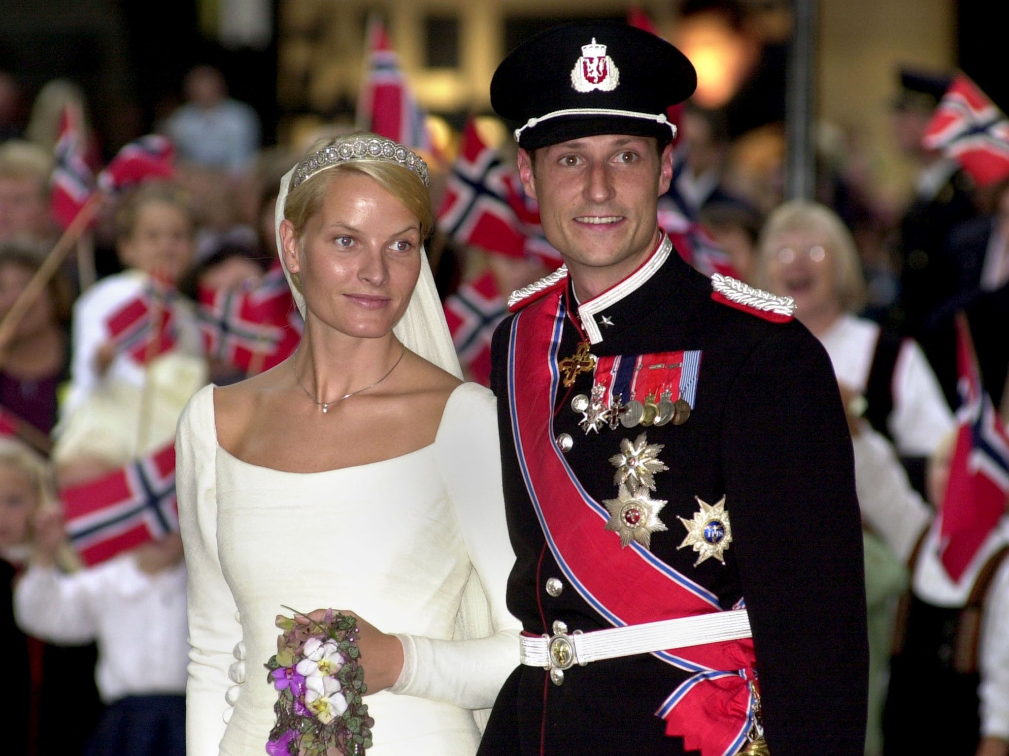 Norwegian Crown Prince Haakon and Mette-Marit Høiby following their wedding at the Oslo Cathedral on 25 August, 2001