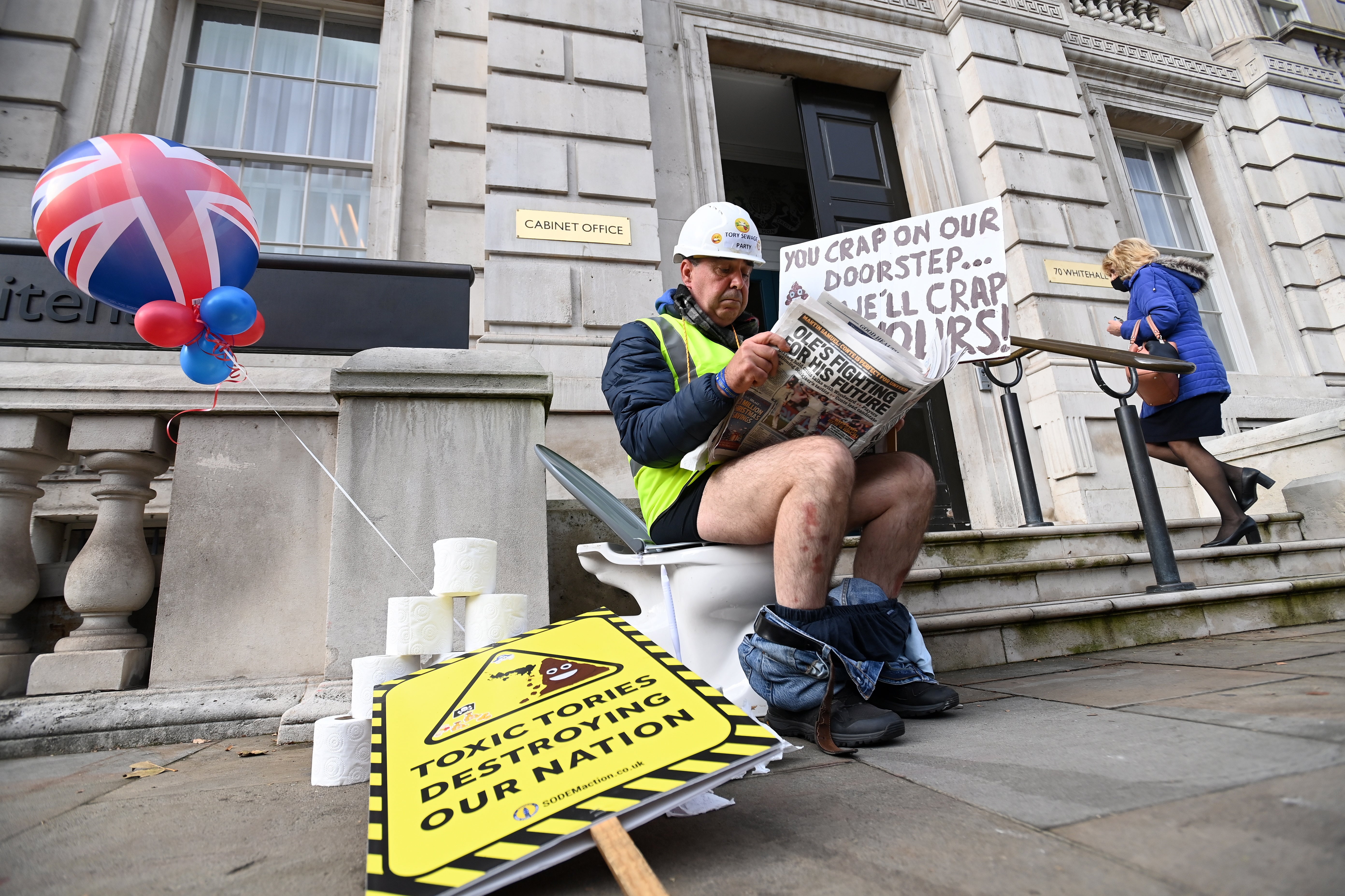 Smash the cistern: protester Steve Bray sits on a toilet outside Whitehall on Wednesday