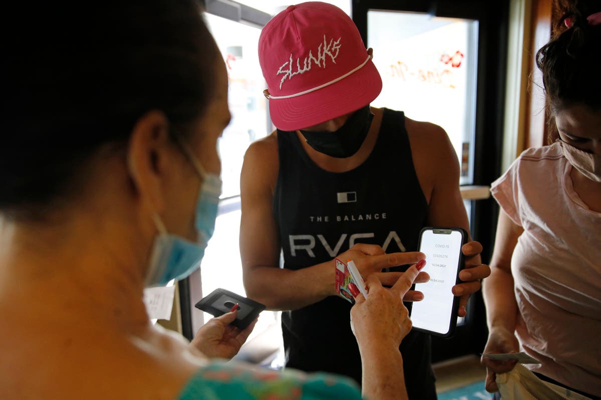 Enforcement of indoor vaccine mandates proves uneven in US