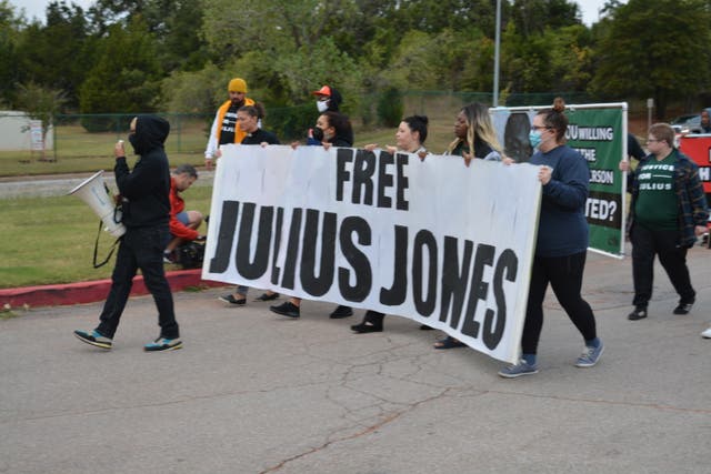 <p>Supports march for Julius Jones, an Oklahoma death row inmate who has long maintained his innocence, on 26 October, 2021.</p>