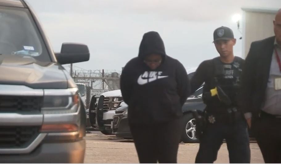 Gloria Williams is taken into custody on Tuesday night