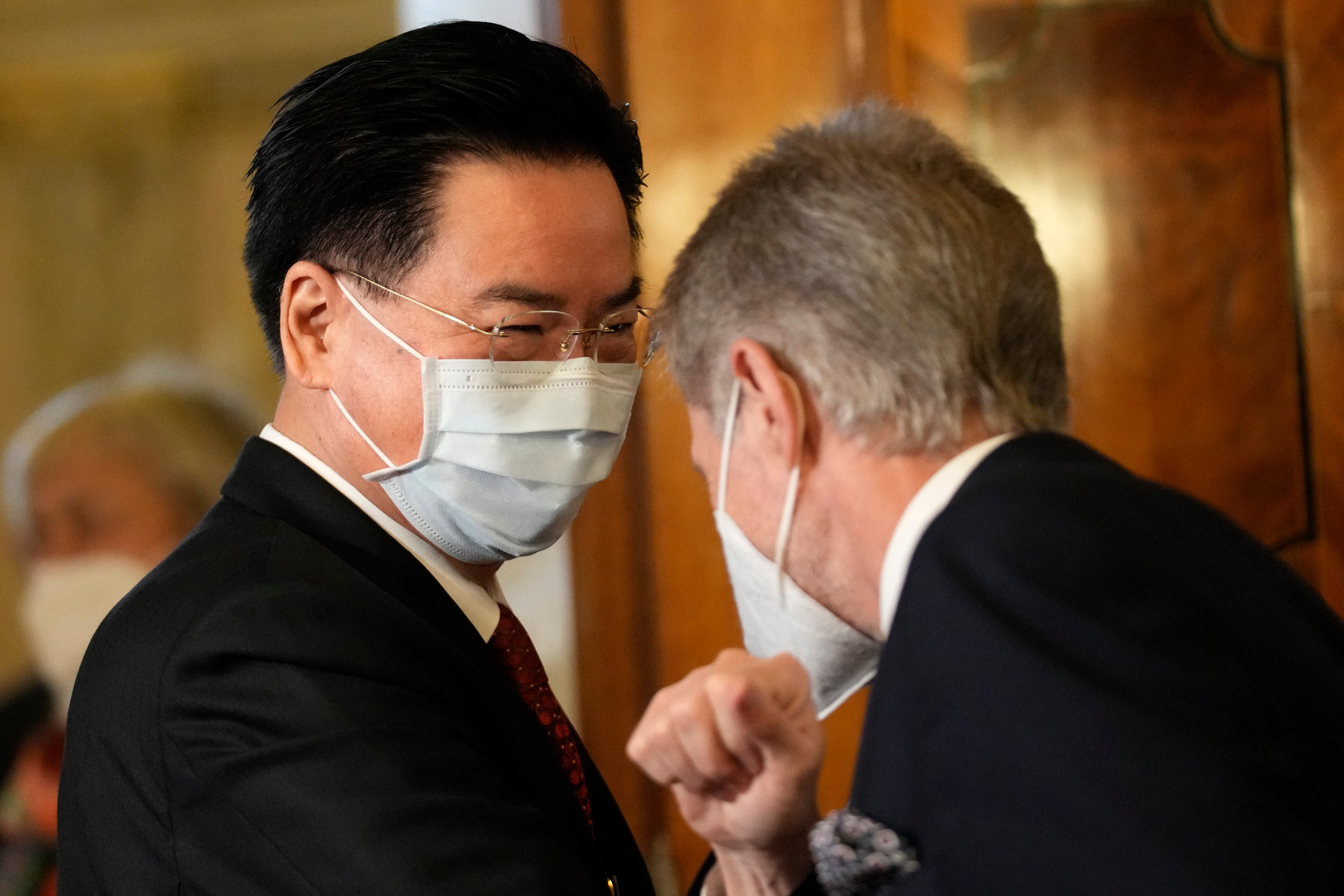 The Speaker of Czech parliament's upper house, the Senate, Milos Vystrcil, right, welcomes Taiwan Foreign Minister Joseph Wu