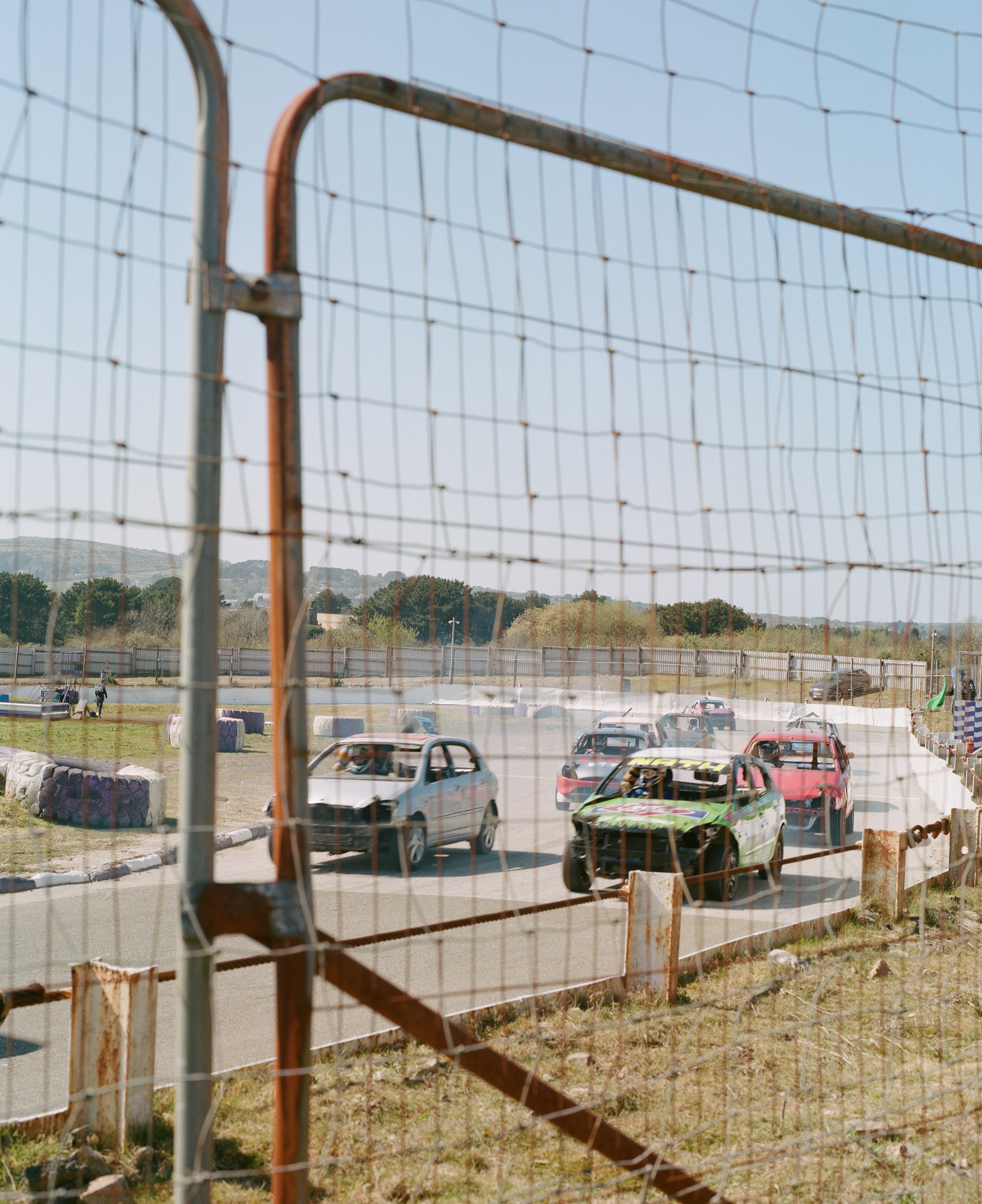 Bust-up cars sprint round the circuit