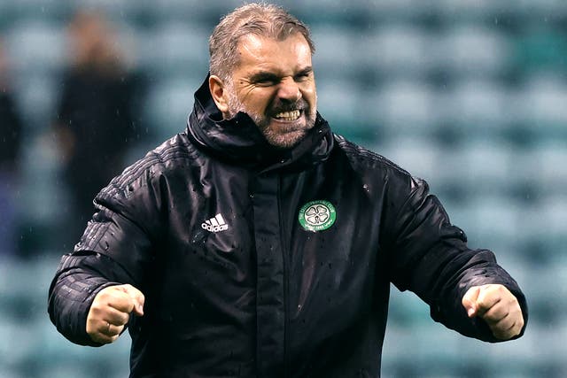 Celtic manager Ange Postecoglou celebrates his team’s win at Easter Road (Jeff Holmes/PA)