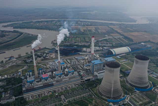 <p>An aerial view of a coal fired power plant in Hanchuan, Hubei province, China, on 13 October </p>