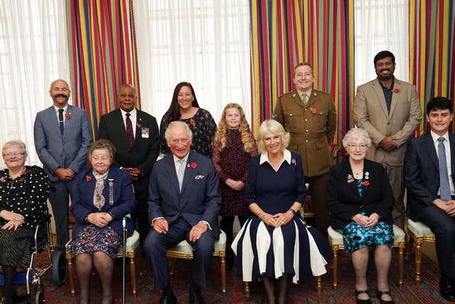 <p> The Prince of Wales (front centre) and Duchess of Cornwall (third right front), with ten Royal British Legion (RBL) Poppy Appeal collectors: (front row left-right) Lesleyanne Gardner, Jill Gladwell, Vera Parnaby, Billy Wilde, and (back row left-right) David Kelsey, Andy Owens, Anne-Marie Cobley, Maisie Mead, Lance Corporal Ashley Martin and Mirza Shahzad at Clarence House, London, during the official launch of the centenary poppy appeal</p>