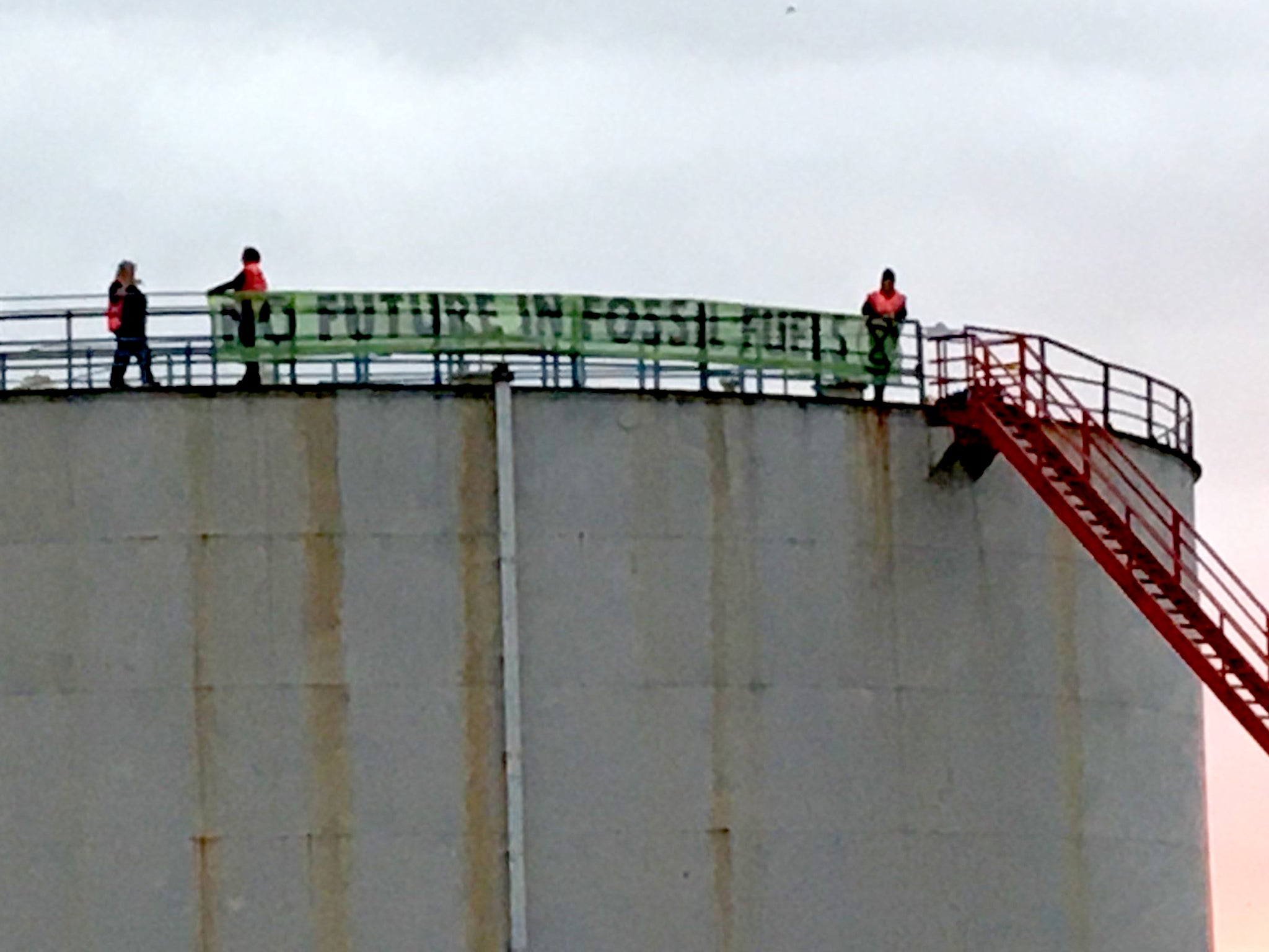 XR protestors climbed a silo at the Fawley oil refinery in Hampshire on Thursday