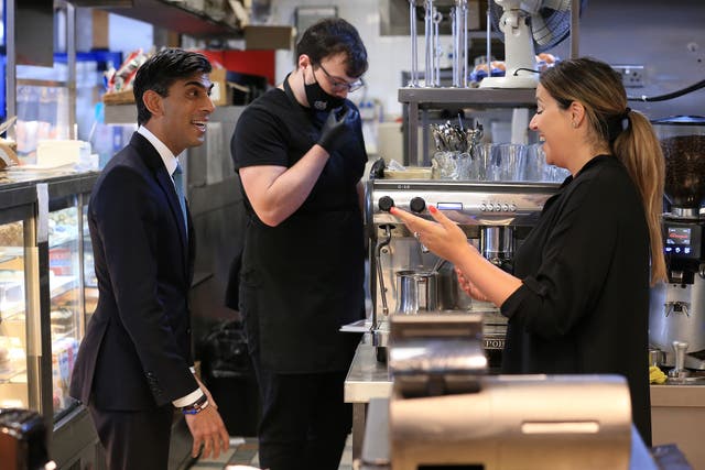 The Chancellor conducted his broadcast interviews in Bury market on Thursday (Lindsey Parnaby/PA)