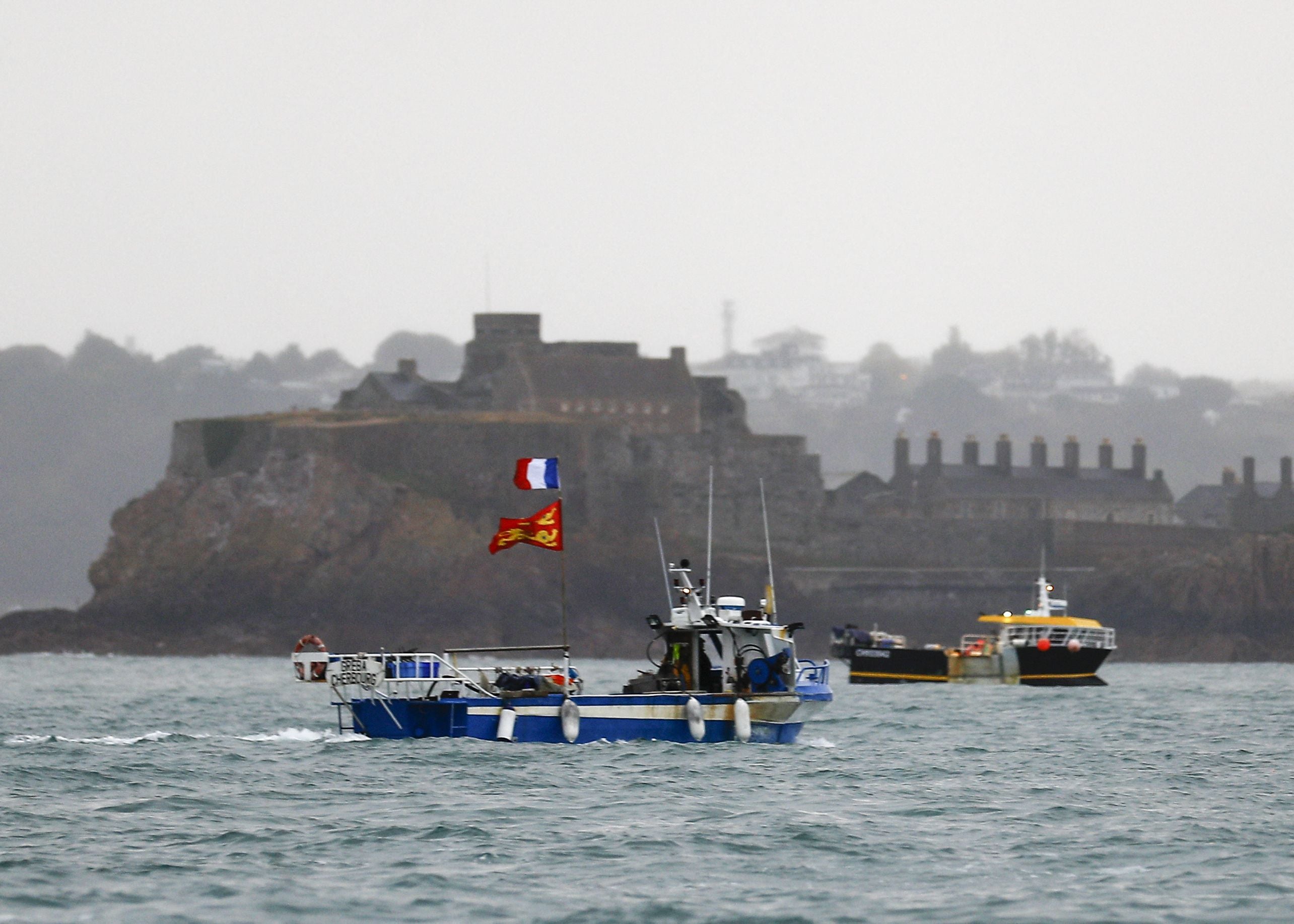 <p> French fishing boats protest in front of the port of Saint Helier off the British island of Jersey</p>
