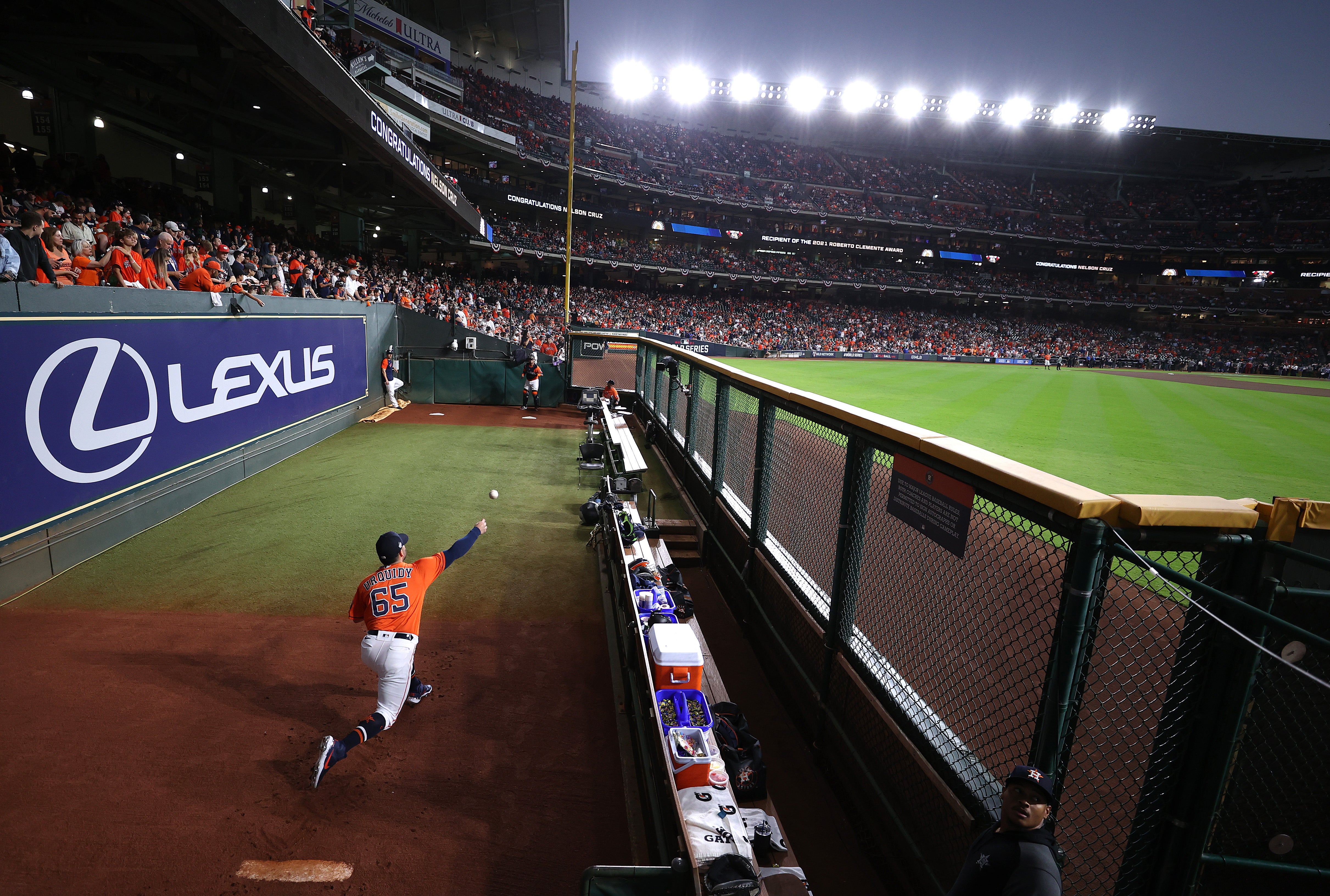 A Houston Astros pitcher warms up in the ‘bullpen’ during the World Series