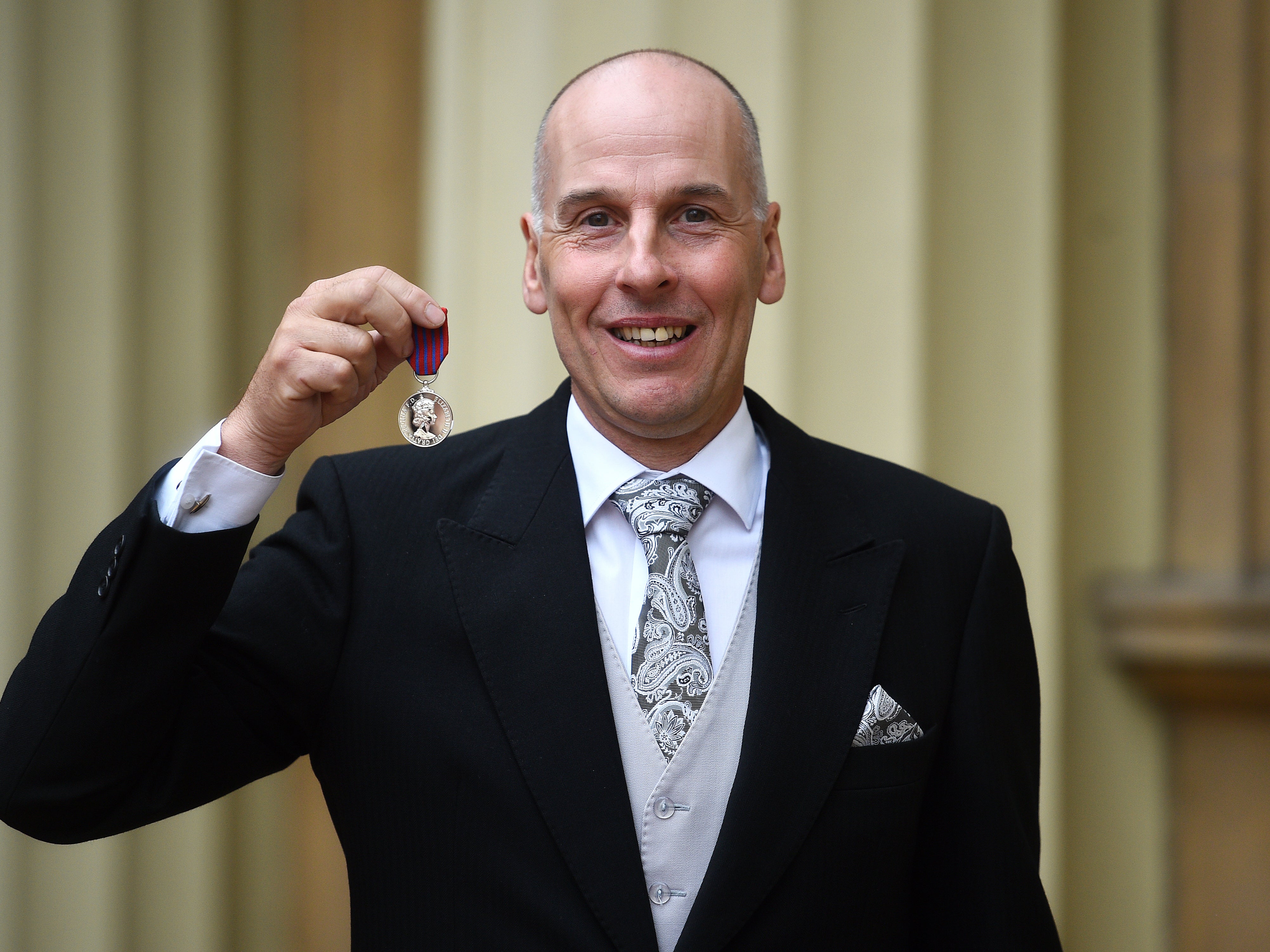 Rick Stanton with the George Medal for bravery in 2019