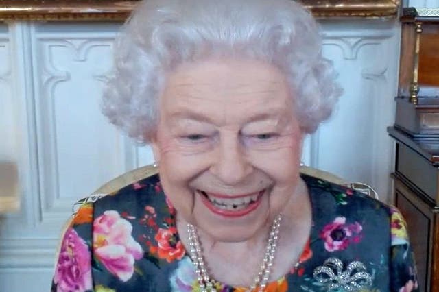 <p> In this Buckingham Palace handout image, Queen Elizabeth II appears on a screen via videolink from Windsor Castle, where she is in residence, during a virtual audience to receive David Constantine and present him with The Queen's Gold Medal for Poetry</p>