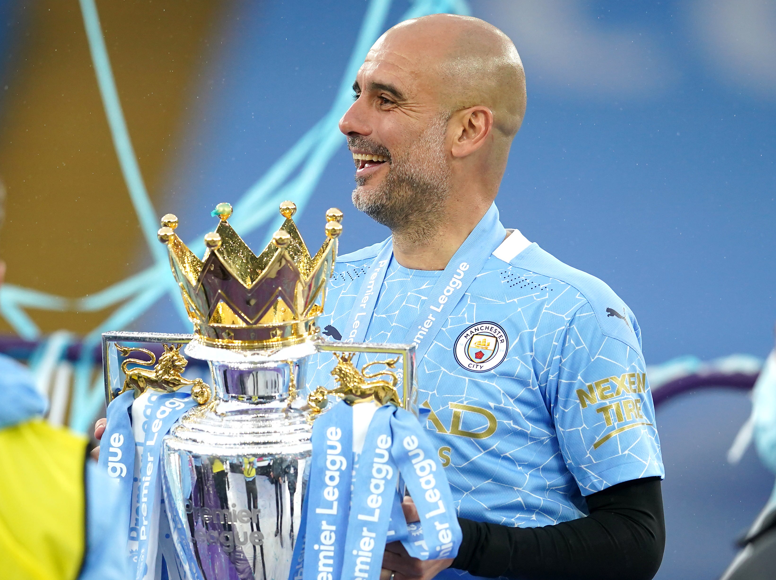 Manchester City manager Pep Guardiola with the Premier League trophy (Dave Thompson/PA Images).
