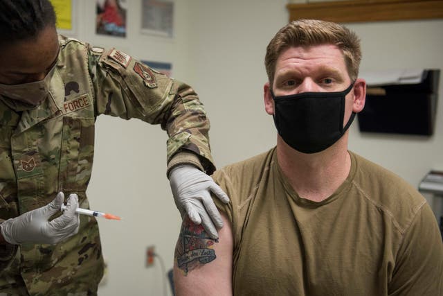<p>In this handout image provided by United States Forces Korea, U.S. Air Force Sgt. Andrew Kehl receives a dose of the Moderna COVID-19 vaccine at Kunsan Air Base on December 29, 2020</p>