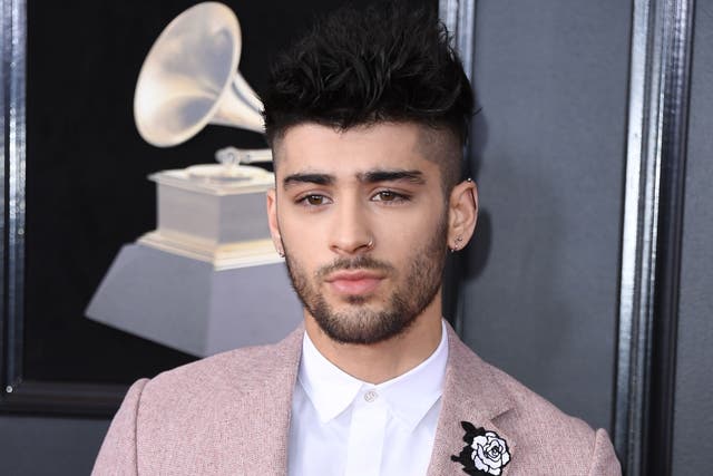 <p>Zayn Malik arrives for the 60th Grammy Awards on 28 January 2018 in New York</p>