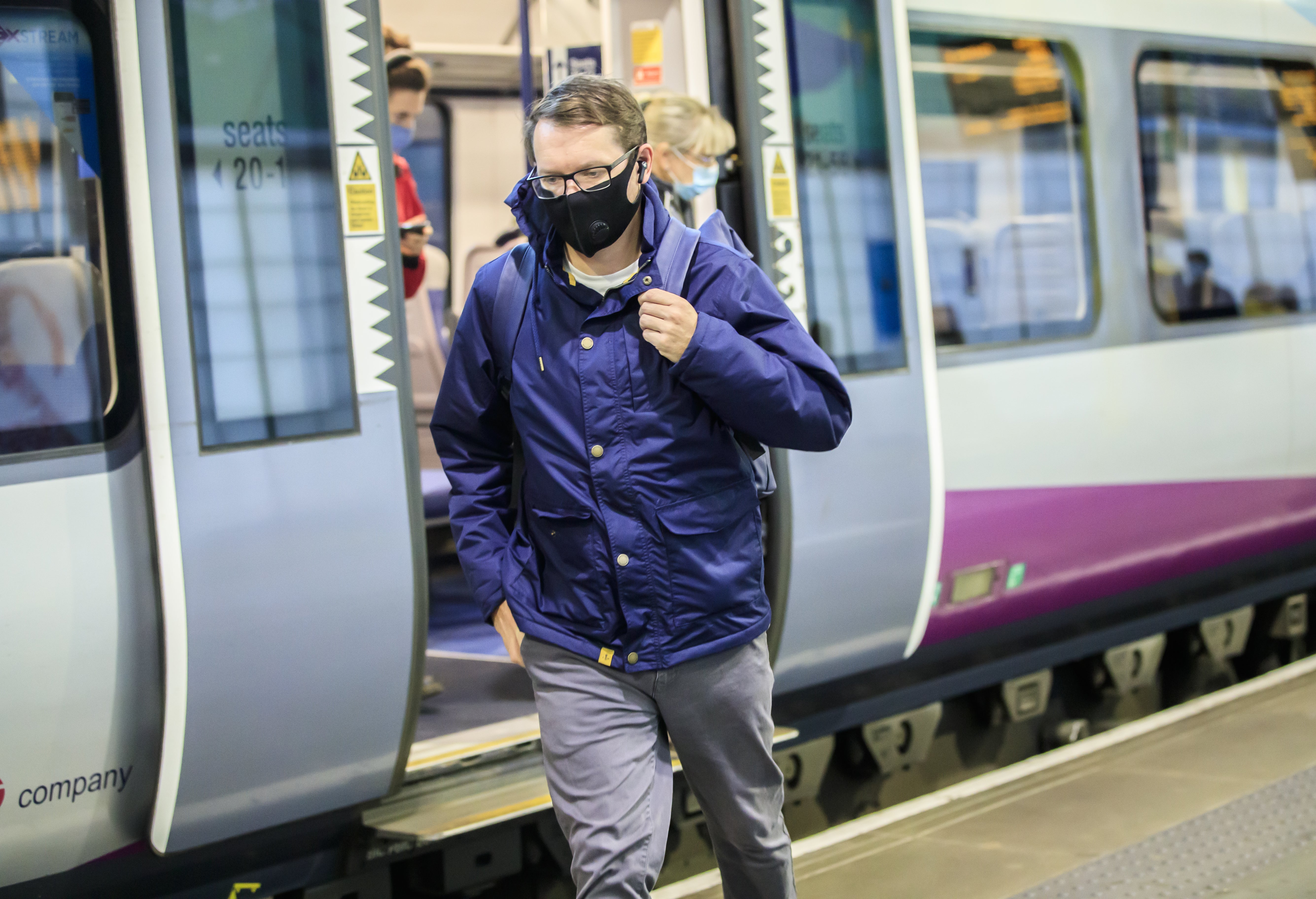 New figures show commuter journeys on Britain’s railways remain at less than half of pre-pandemic levels (Danny Lawson/PA)