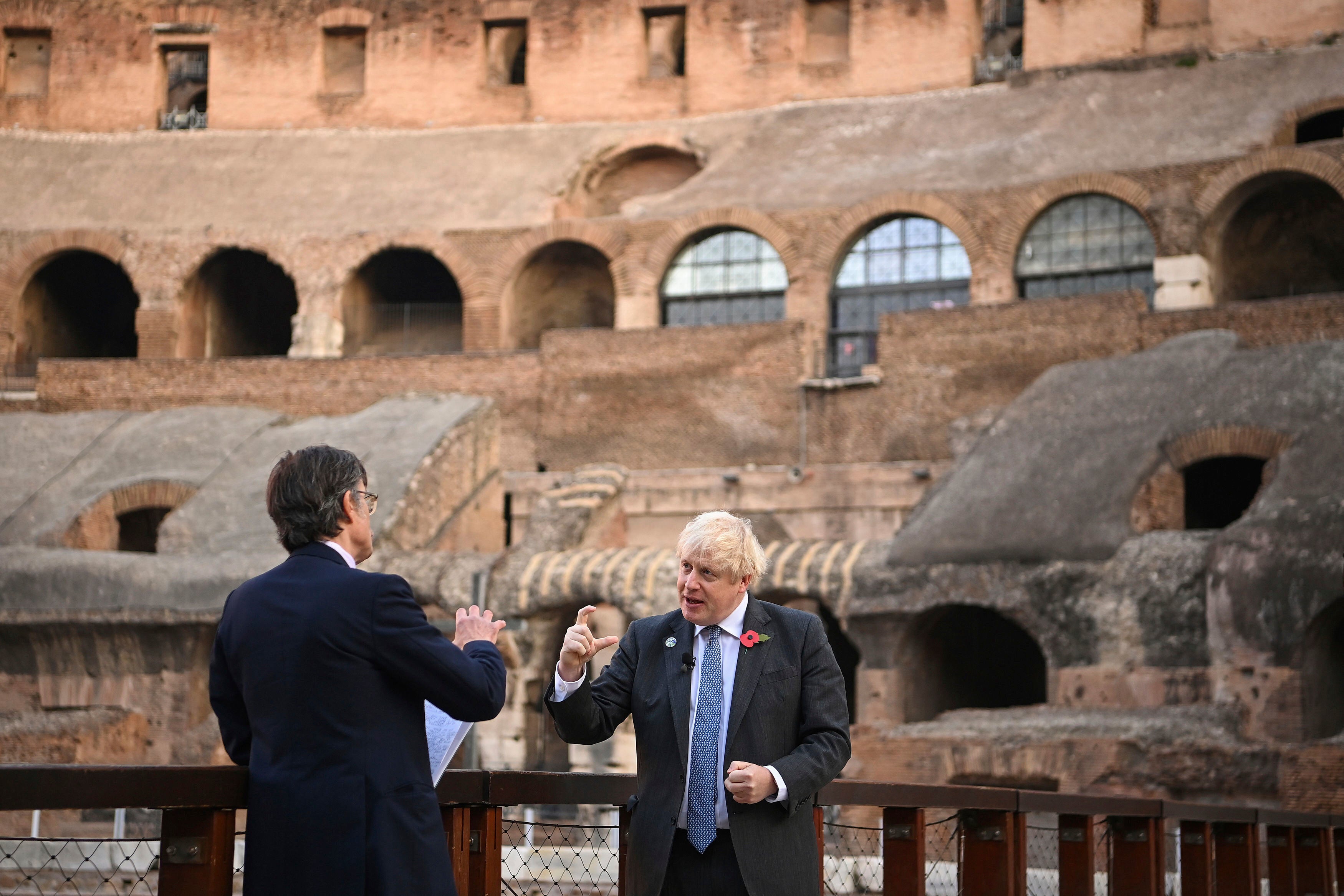 Boris Johnson, in Rome, doing what the Romans don’t do, namely visiting the Colosseum