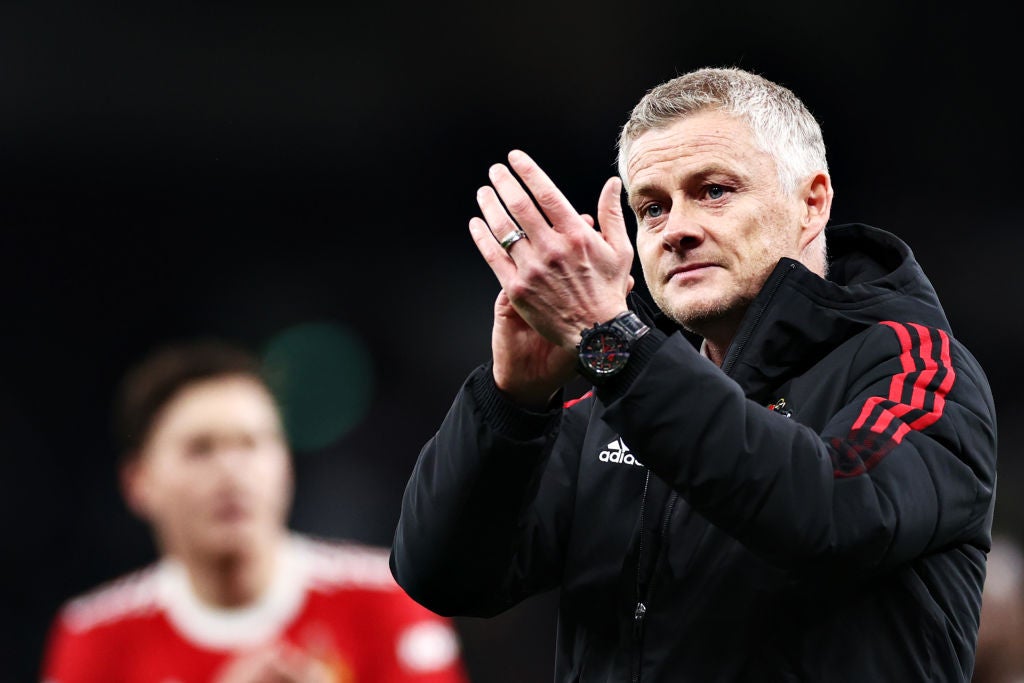 <p>Solskjaer applauds the unrelenting away support at yesterday’s match </p>