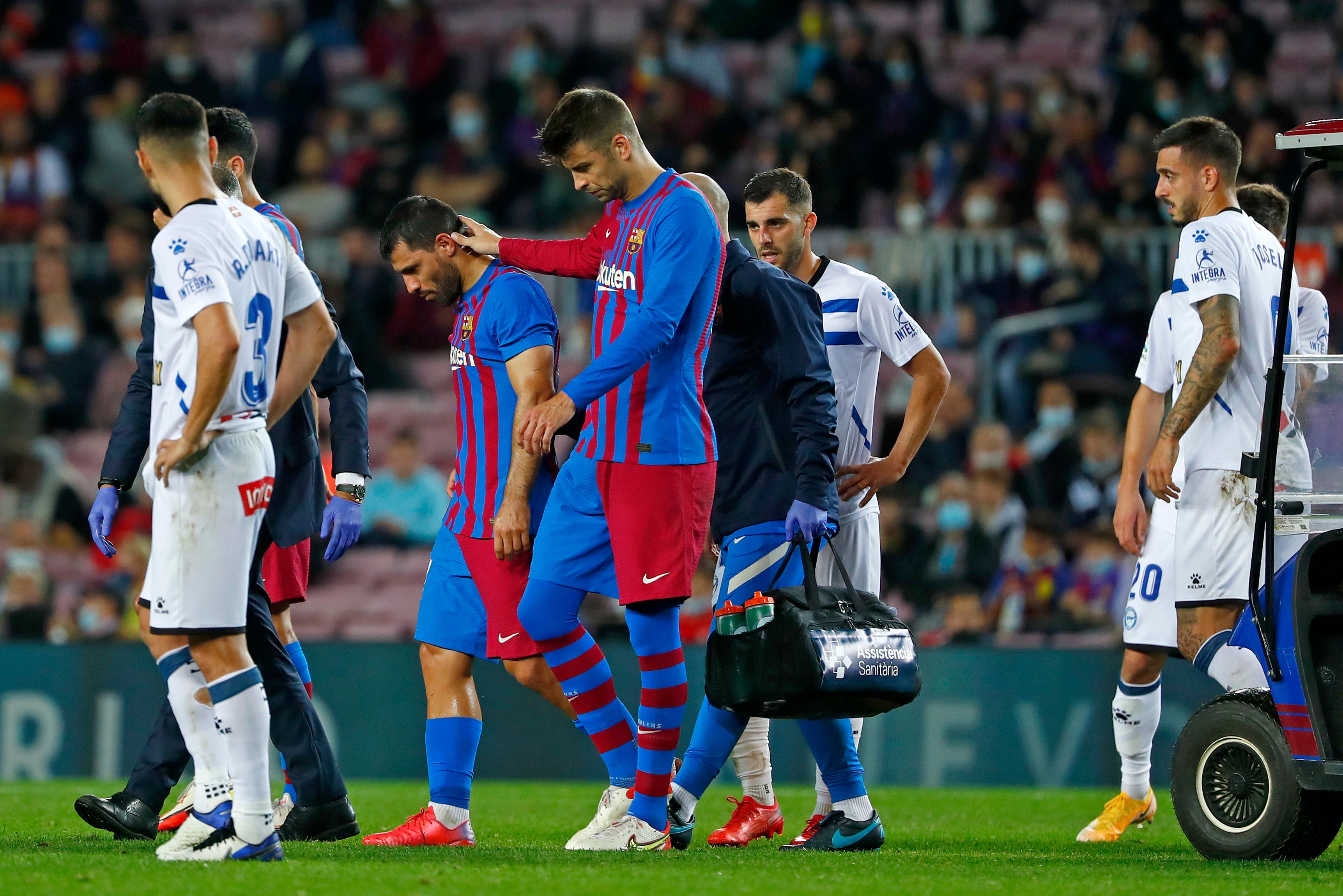 Barcelona’s Sergio Aguero, second left, lasted less than 45 minutes against Alaves (Joan Monfort/AP)