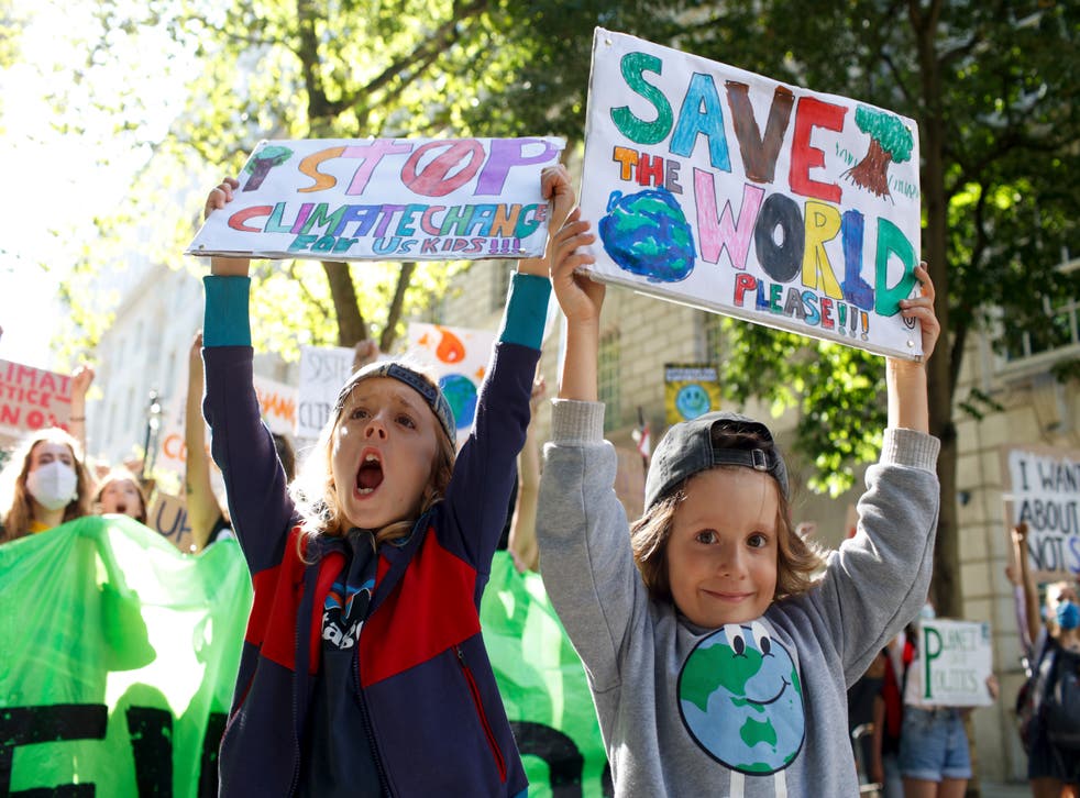 <p>Child activists join a march through Westminster during a ‘climate strike’ demonstration</p>