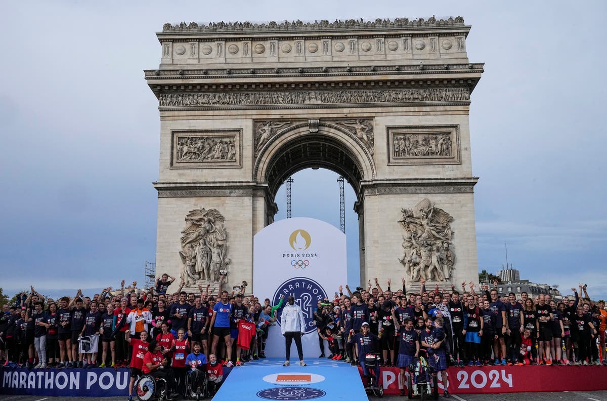 Paris runners race Olympic marathon champion Kipchoge The Independent