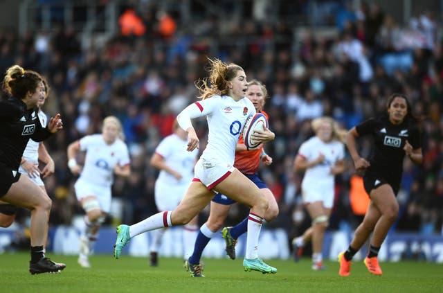 <p>Holly Aitchison of England breaks away before scoring their side's fifth try</p>
