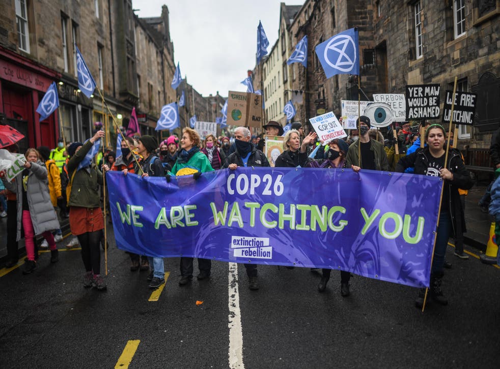<p>Extinction Rebellion activists protest in Edinburgh as the Cop26 climate conference takes place in Glasgow</p>