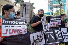 8 Hong Kong activists on trial over banned Tiananmen vigil