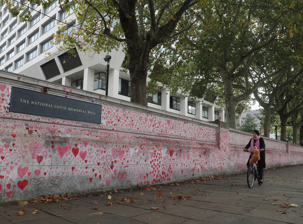 <p>The National Covid-19 Memorial Wall, dedicated to victims, is on the South Bank in front of St Thomas’ Hospital</p>