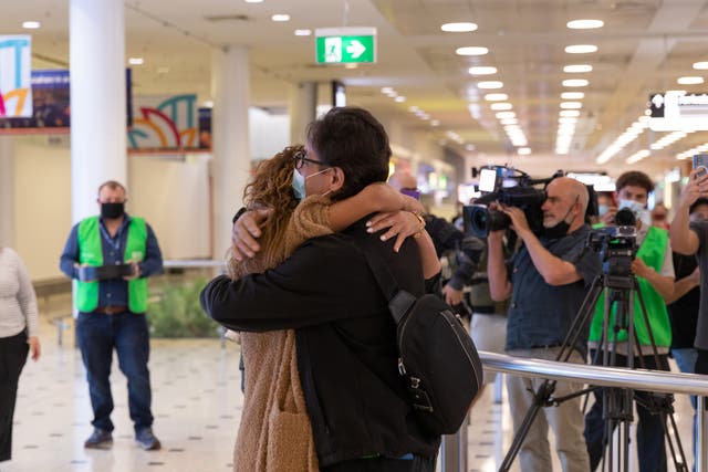 <p>Emotional hugs at Sydney’s international airport</p>