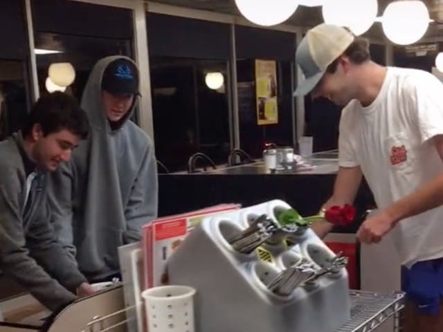 <p>More than two million people have watched footage of the students clean a North Carolina Waffle House</p>