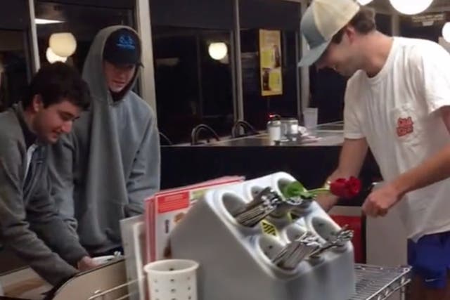 <p>More than two million people have watched footage of the students clean a North Carolina Waffle House</p>