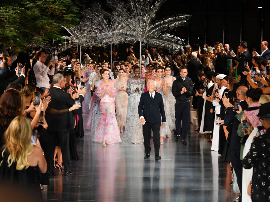 Italian fashion designer Giorgio Armani walks the runway during the Giorgio Armani “One Night Only Dubai” fashion show at the Armani Hotel Dubai