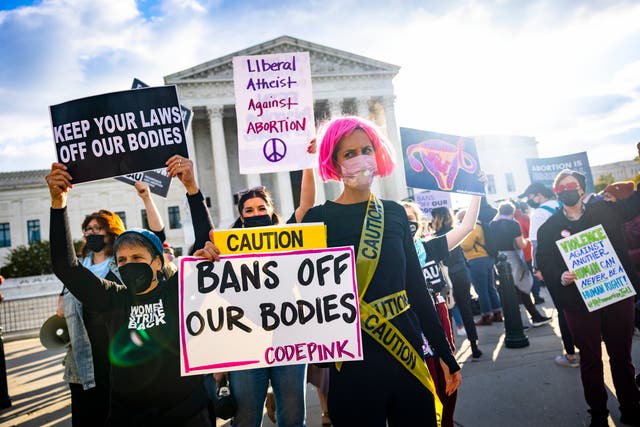 <p>Abortion supporters and protestors gather outside the US Supreme Court as the high court hears arguments in two challenges to a Texas law that bans most abortions in Washington, DC</p>