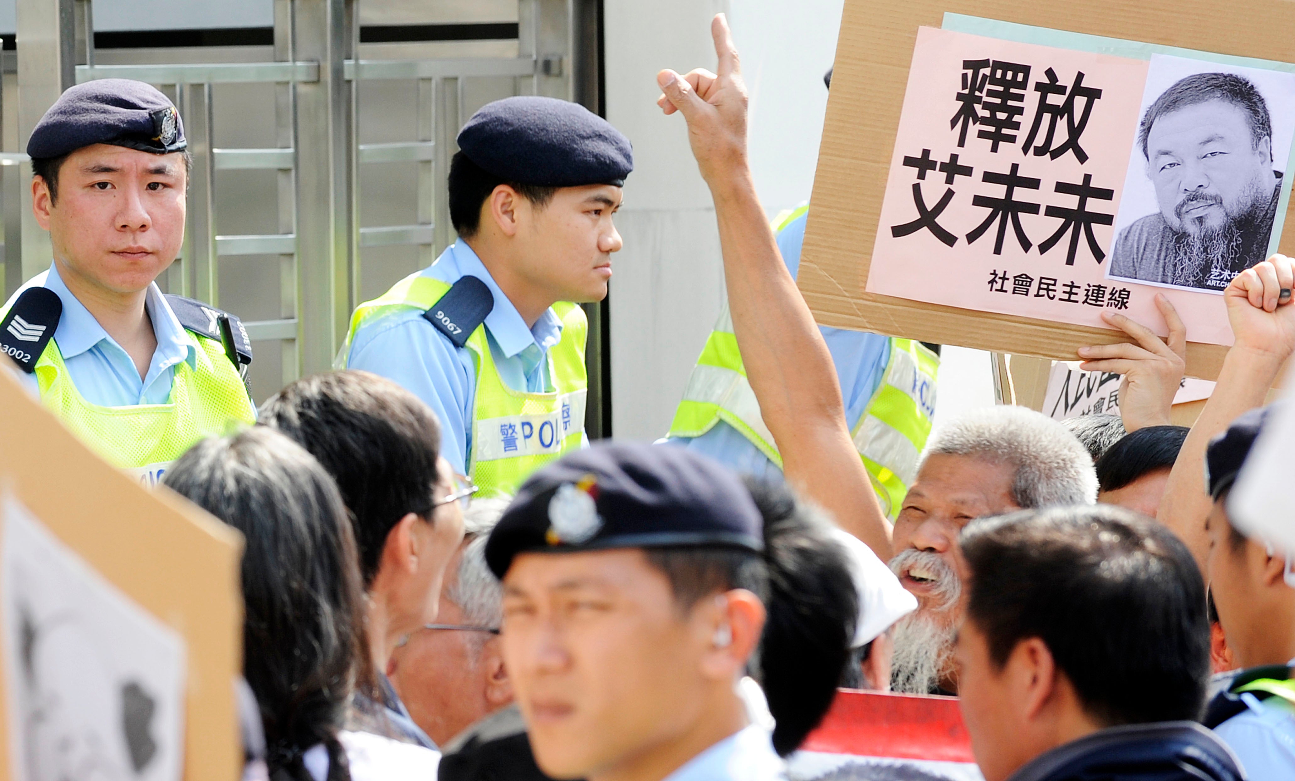 Activists demanding the release of Ai in Hong Kong in April 2011, who was detained for ‘economic crimes’ on 3 April