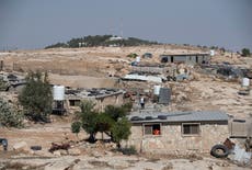 Israel OKs Palestinian homes after advancing settlements