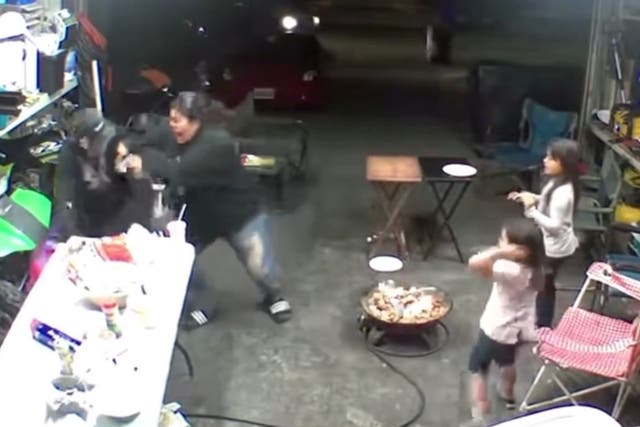 <p>Footage shows a Calfornia mother defending herself from an intruder </p>
