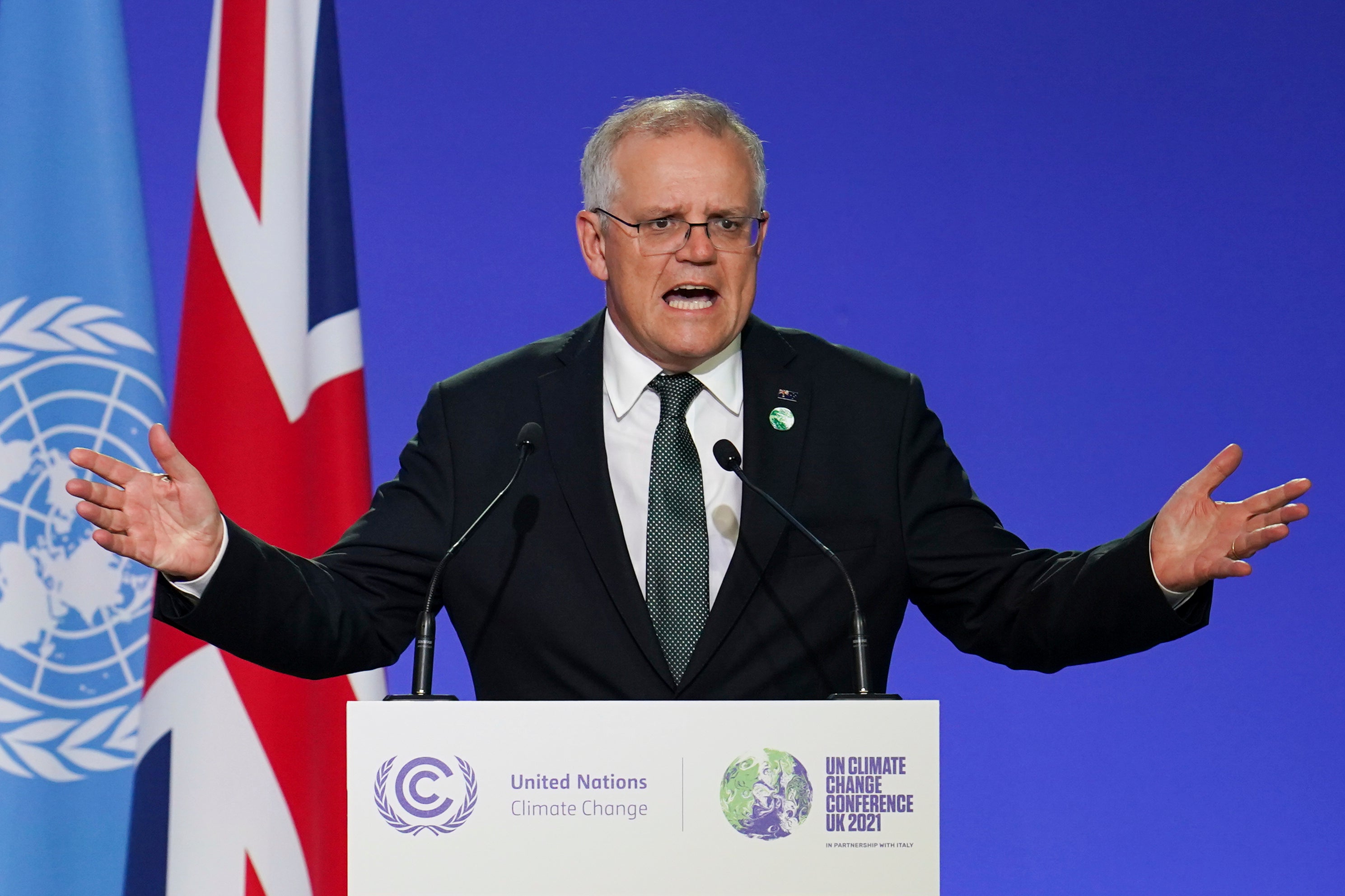 File: Australian prime minister Scott Morrison delivers an address during the COP26 Summit
