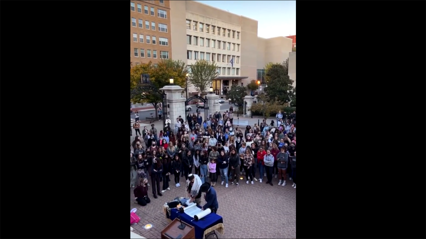 Members of the Jewish community took part in a Torah recitation ceremony after the Jewish scripture was desecrated on the premises of the George Washington University